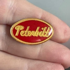 Vintage Peterbilt Logo Pin – Red & Gold Semi Truck Brand Enamel Badge