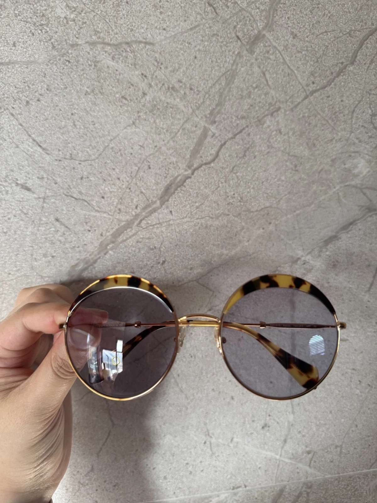 Occhiali da sole rotondi Miu Miu