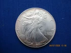1986 "AMERICAN EAGLE" ONE DOLLAR ONE OUNCE FINE SILVER COIN