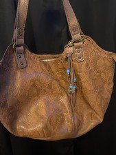 The Sak Indio Tote Pre-owned Tobacco Floral Embossed Leather Shoulder Bag
