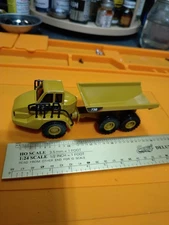(((CAT 730 ARTICULATED TRUCK  1/87 DIECAST MASTER'S TRUCK)))