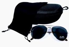 Aviator Sunglasses With Gold Metal Frame And Black Polycarbonate Lenses.