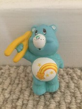 Vintage 80er Jahre Care Bear Wunschbär hält einen Wunschknochen