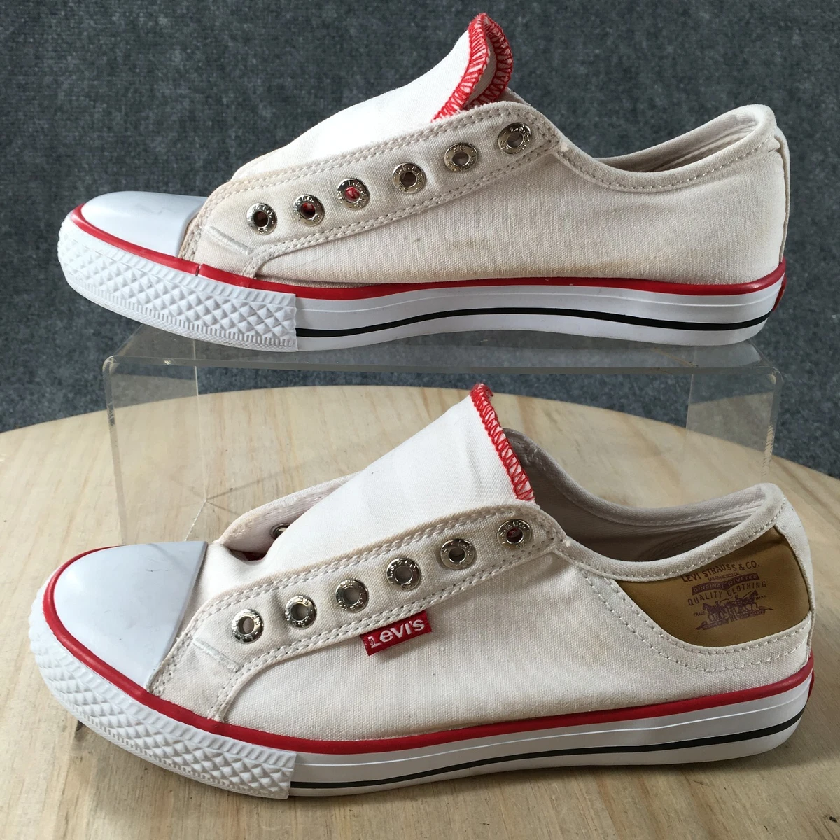 Red and store white levi shoes
