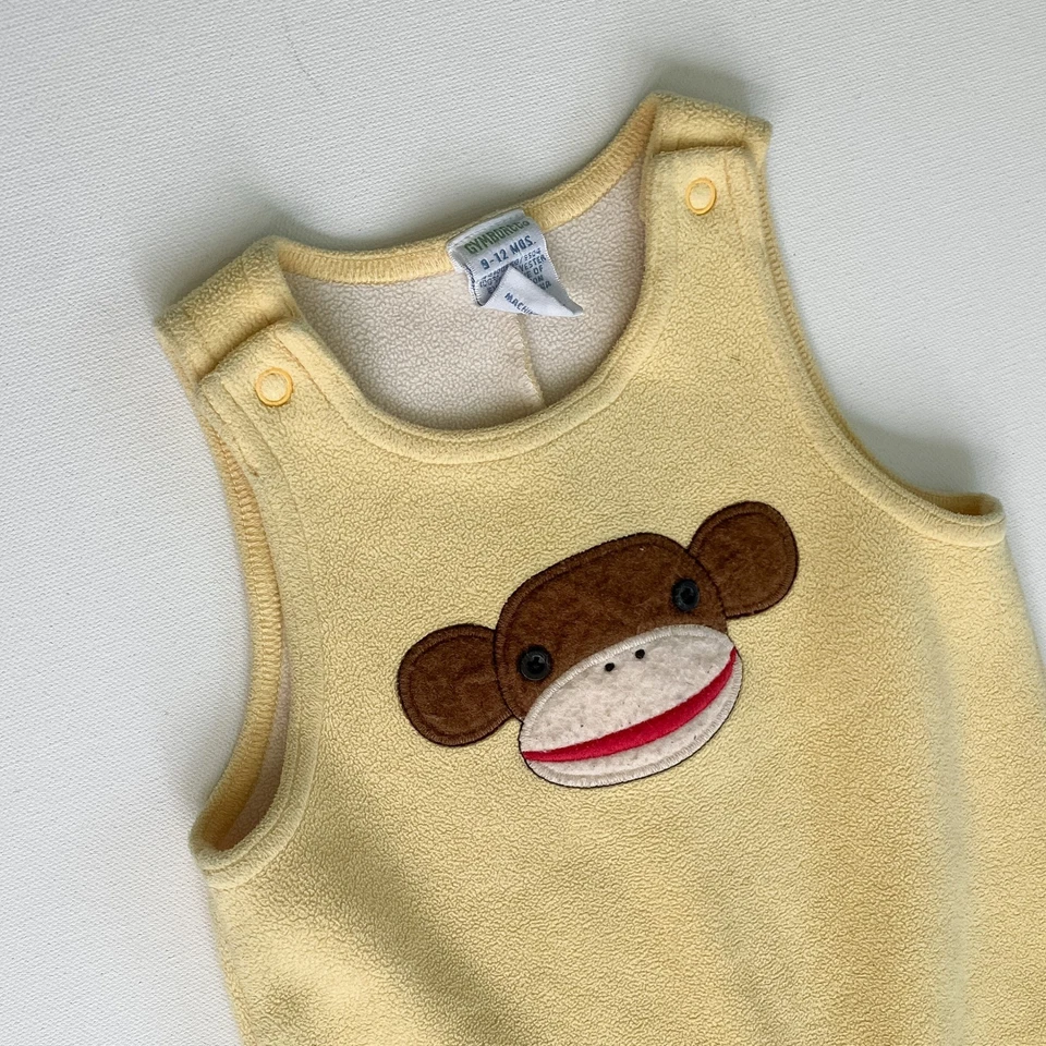 Mameluco para bebé Gymboree 9-12 meses amarillo polar calcetín aplique de mono Foto 2 de 4