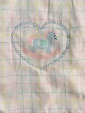 Handmade rocking horse themed quilt , ruffled on 3 sides,  43  x44  . A509