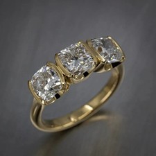 3.00Ct Cushion Cut Moissanite Three Stone Engagement Ring 14K Yellow Gold Plated