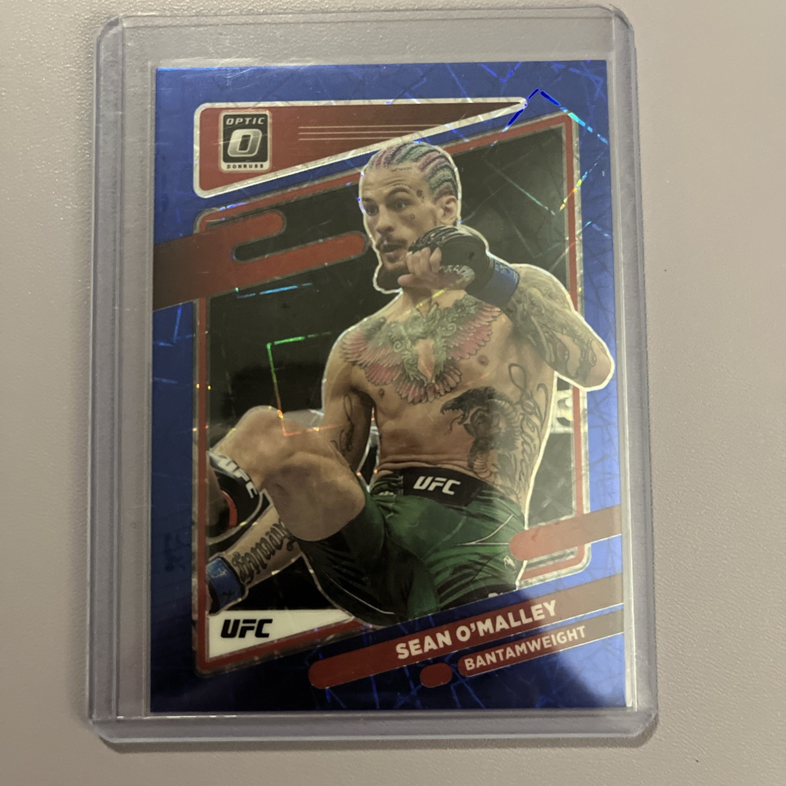 2022 Panini Donruss Optic UFC - Sean O'Malley #9 Blue Velocity Prizm