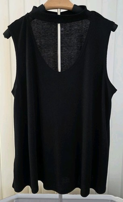 #ad V neck tank top with a high neck band Classic Style. Flirty Date Night. ￼ $10.20