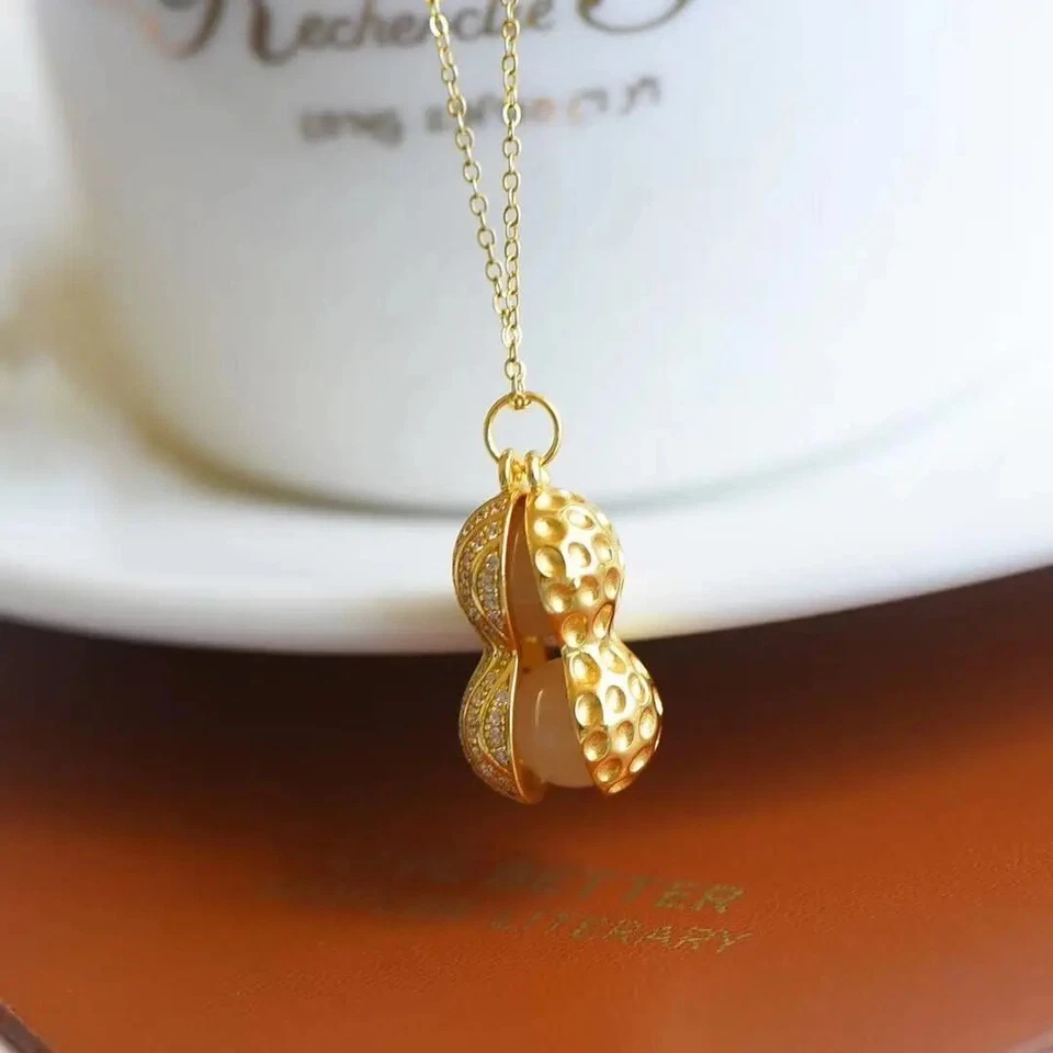 Collar de cacahuete de jade hetiano plata con diamantes incrustados colgante de altura cacahuete Foto 3 de 4