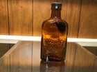 Four roses empty whiskey bottle holds 50ml. or 1.7 oz. 4 inch bottle odd top — photo 2