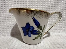 Cottier Freres-Switzerland-Blue Floral/Gold Trim Creamer #603