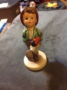 hummel boy with umbrella