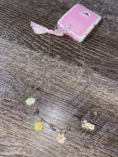 Claire  s Easter chick bunny egg flower girls charm necklace