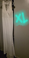 Elegant white wedding dress Full length train has lace in the center zipper Back