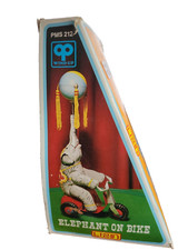 Elephant On Bike Wind-Up Tin Toy