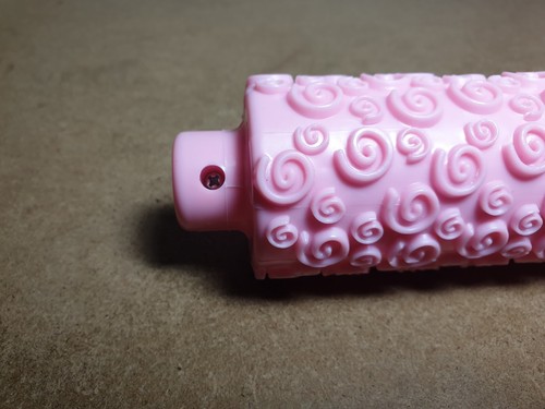 Plastic pink embossed rolling pin. Swirl pattern. 10.5" length. - Picture 3 of 6