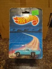 Hot Wheels Light Blue '57 T-BIRD (3993) Vintage 1986  DAMAGED CARD