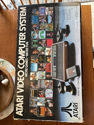 Atari Video Computer System 2600A Vintage 1980 Controllers and Paddles + 7 games
