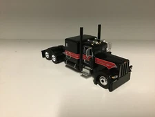1/64 DCP BLACK RED PETERBILT 389 60" BUNK 270" FRAME (5 5/8" long)