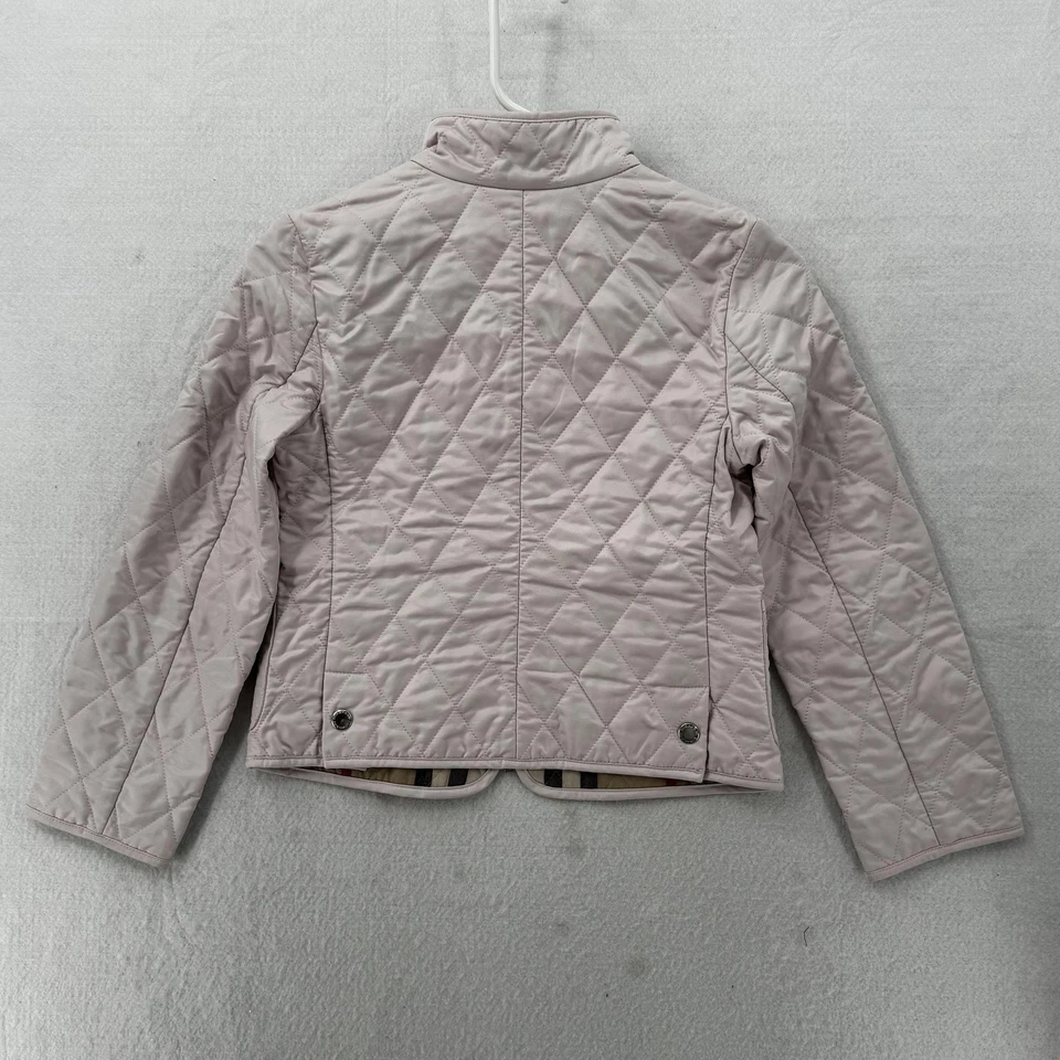 Chaqueta acolchada Burberry para niñas 10 años rosa forro a cuadros Nova cremallera bolsillos delanteros Foto 3 de 4