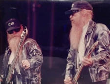 8x10 Color Photograph of ZZ-Top Playing Guitar On Stage