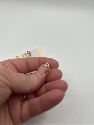 Tiny Little Gold Hoop Earrings With A Pink Little Diamond Studs