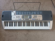 Casio LK-100 61-Key Electronic Keyboard with MIDI Speakers