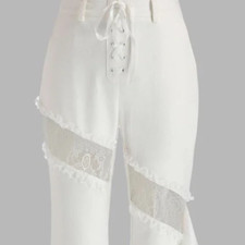 white bell-bottoms with laces at the thigh