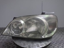 Scheinwerfer links  Kia Carnival II (UP) 507062