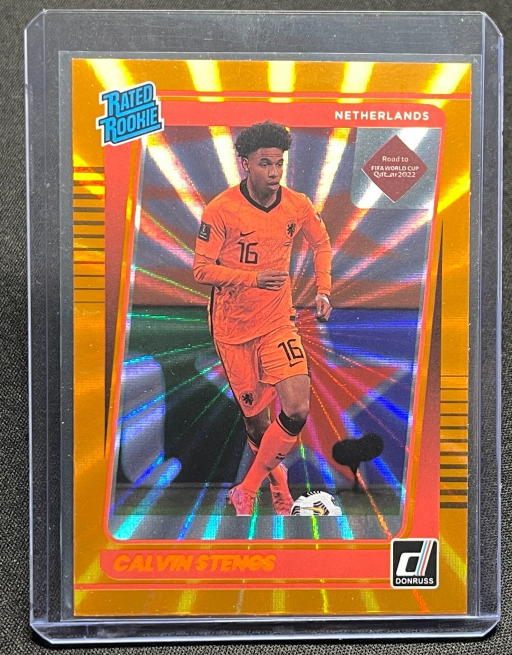 2021-22 Panini Donruss Road to Qatar Calvin Stengs Orange Holo Laser #186 RC