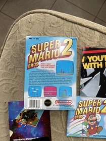 Original NES Nintendo Super Mario Bros 2 BOX MNUAL Black Seal Near MINT  NO GAME
