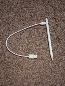 White Stylus Pen with USB Charging Cable. NEW ! Comes with instructions.