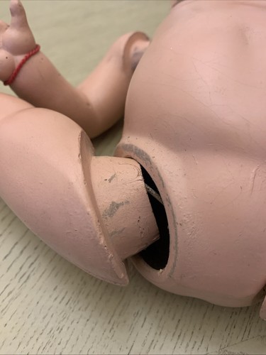 white 430mm or 17” jointed doll with closed mouth painted eyes. impress hair.14B - Picture 6 of 10