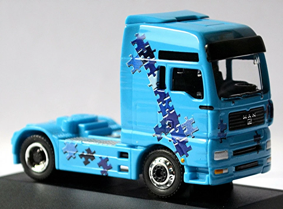 Man Tg-A XXL Trattore da Solista Puzzle Blu 1:87 Schuco 22612 - Immagine 2 di 4