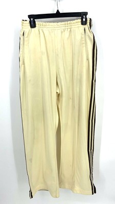 cream adidas track pants