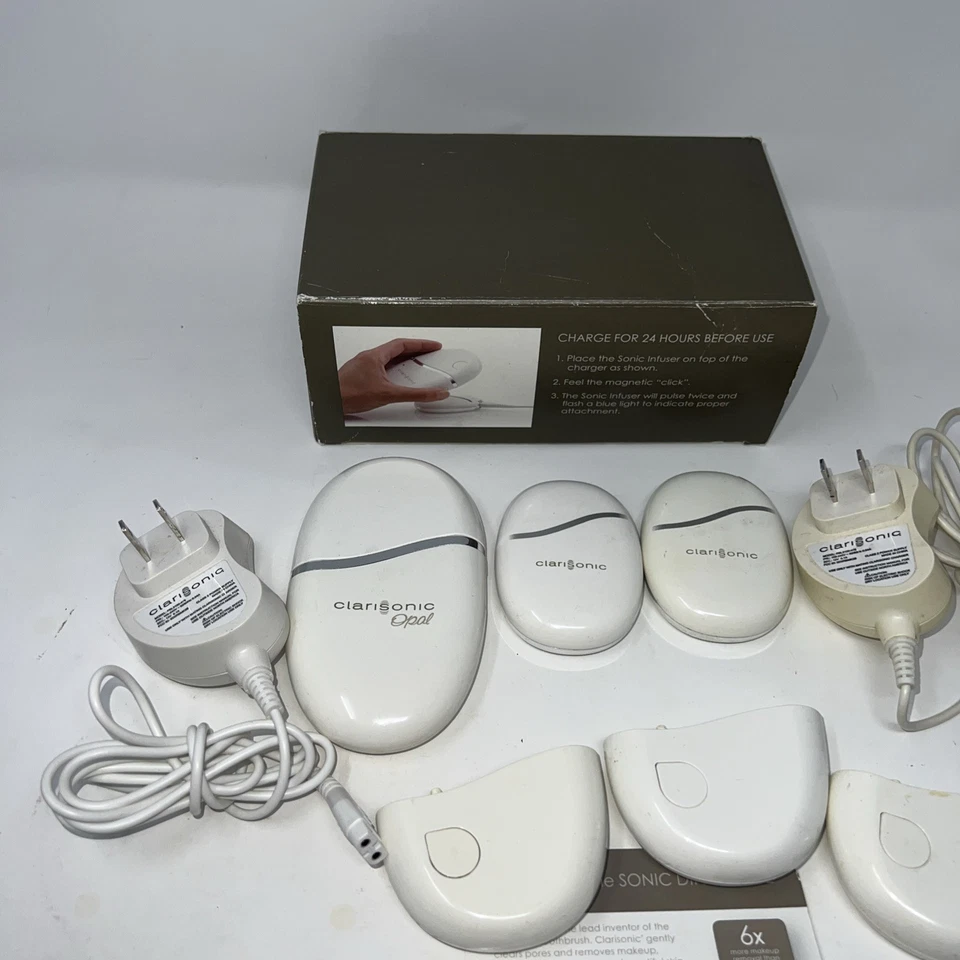 Lote de 6 cargadores de infusión sónicos Clarisonic Opal con 2 adaptadores de CA y caja Foto 2 de 4