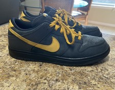 nike flyby low black and gold