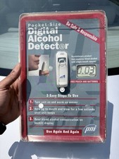 PNI digital alcohol detector features a white, pocket-sized device