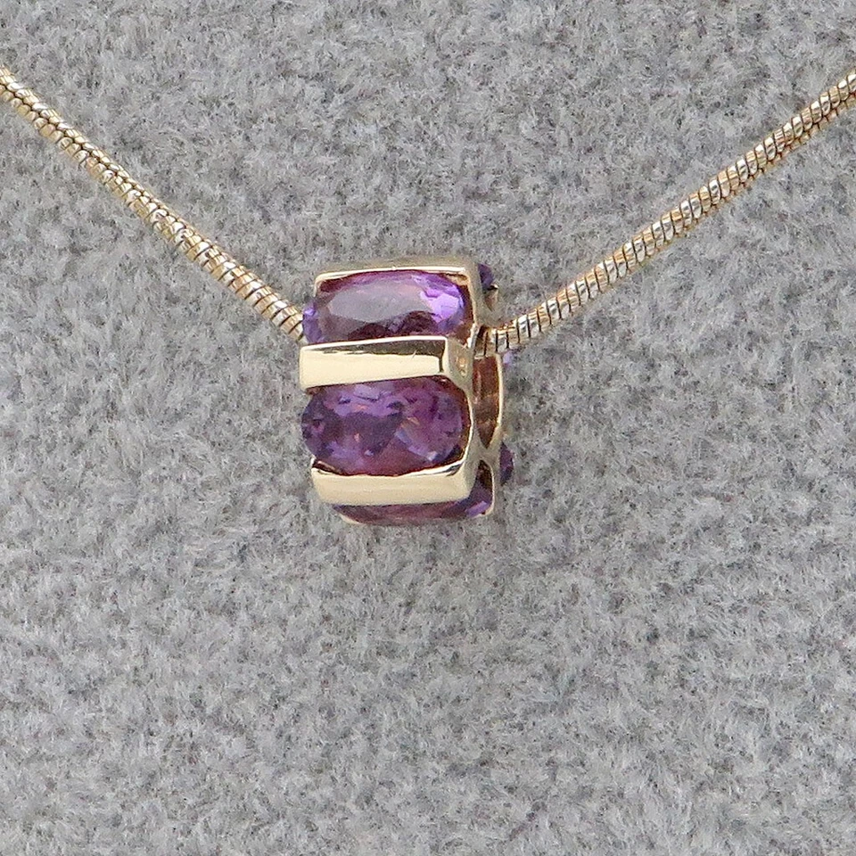 Anhänger Läufer mit Amethyst Besatz in 375/9K Gelbgold - Bild 2 von 4
