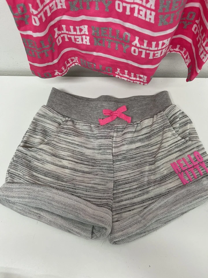 Conjunto de 3 camisetas sin mangas, pantalones cortos y chaleco con capucha Hello Kitty para niñas talla 8 rosa y gris Foto 2 de 4