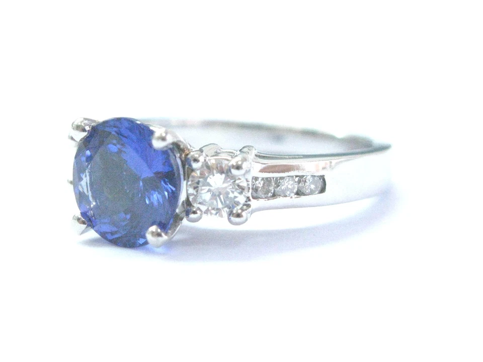 Anillo de compromiso de tres piedras con diamantes de tanzanita gema de platino 2,44 quilates Foto 2 de 4