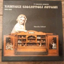 Libro. BAMBOLE GIOCATTOLI AUTOMI. 1982.