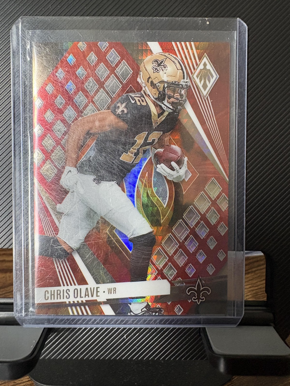 2023 Panini Phoenix #69 Chris Olave Fire Burst #/340 New Orleans Saints