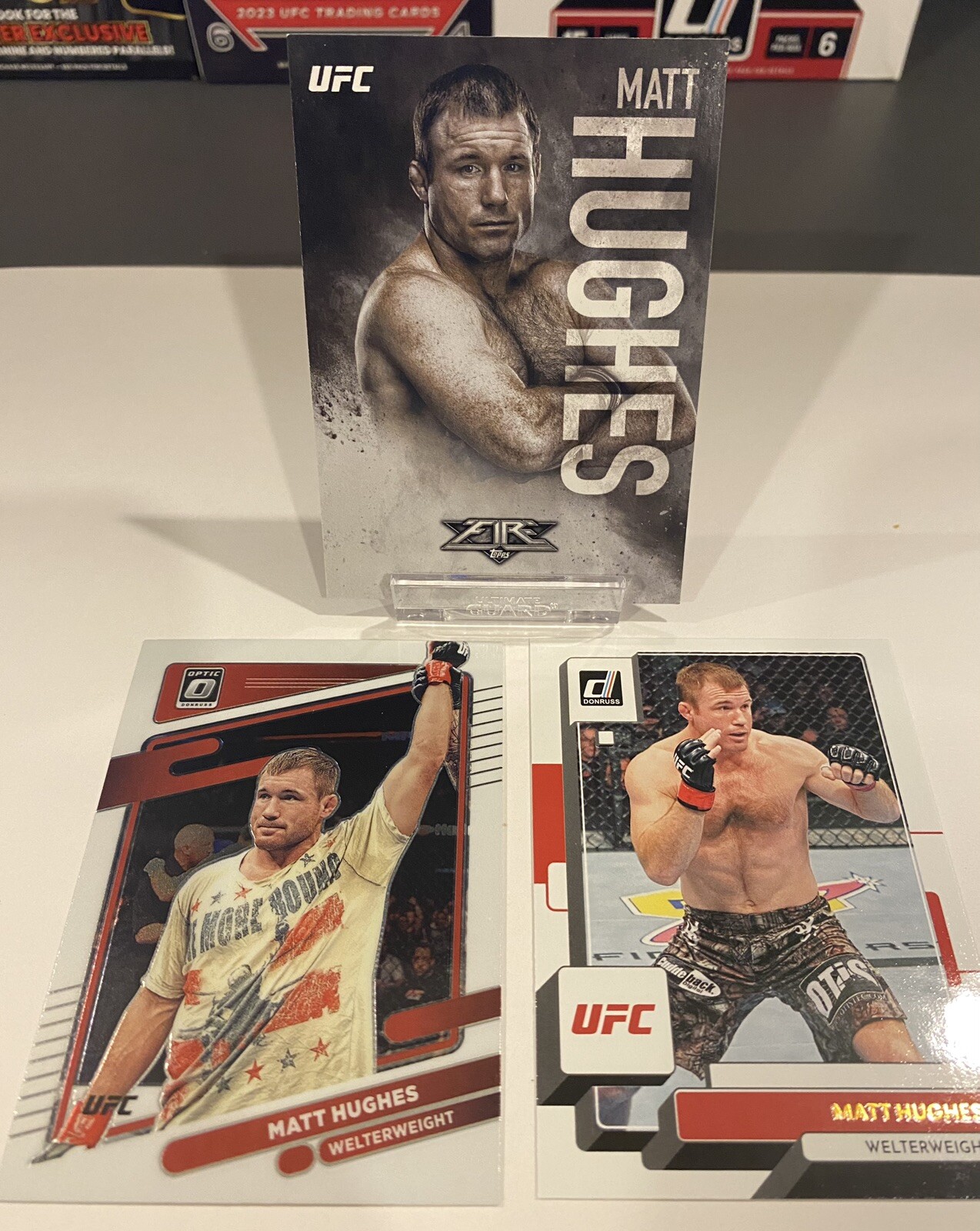 Matt Hughes x3 UFC Card Lot! 2017 Topps Fire, 2022 Panini Optic, 2023 Donruss