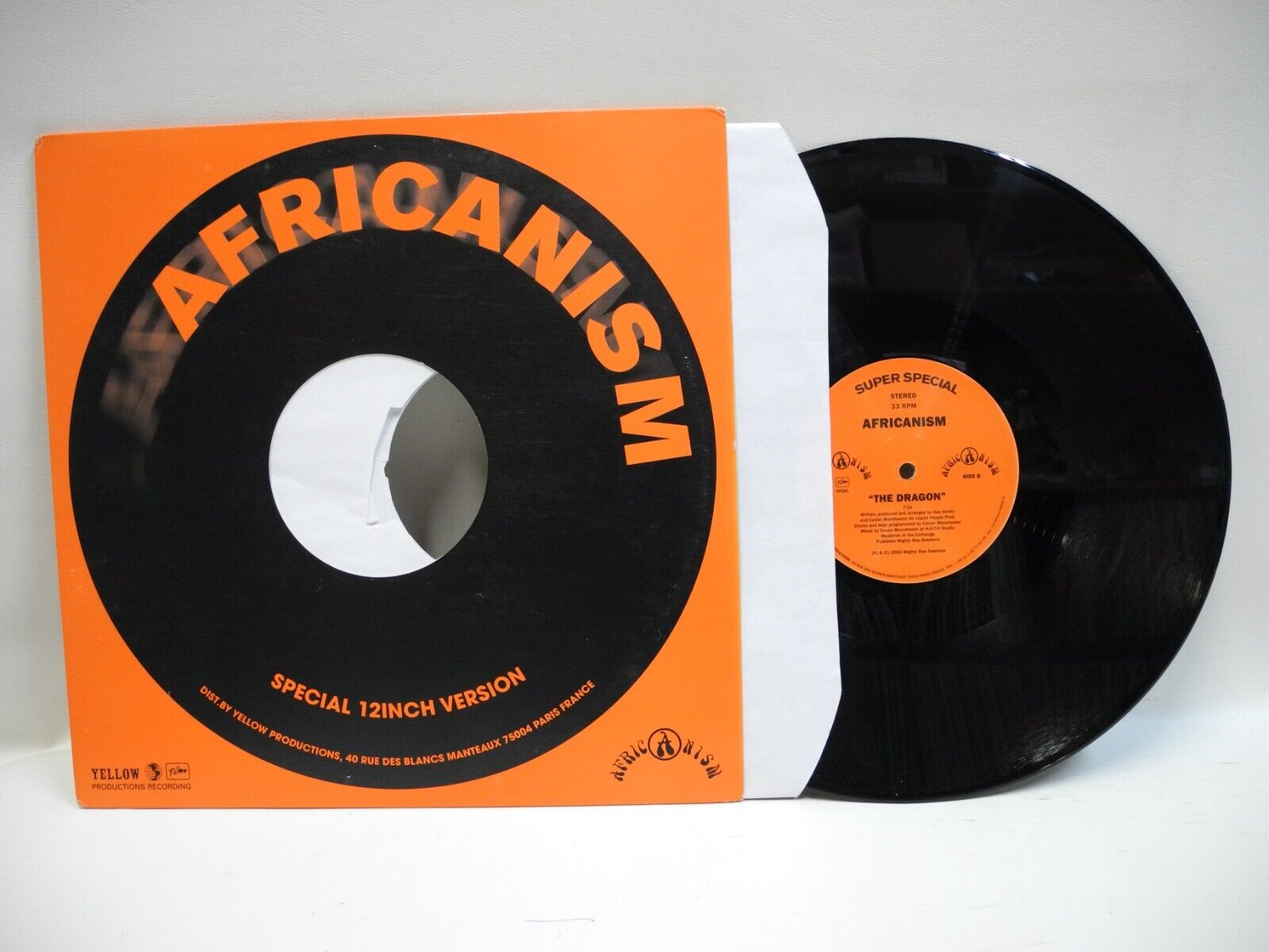AFRICANISM - THE DRAGON/LOVE IS THE ANSWER - 2001 VG+ GRADED VINYL