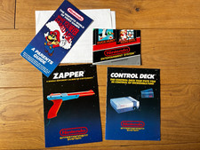Nintendo NES games console paperwork
