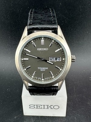 Seiko Titanium Men's Dark Grey Dial Day Date 37mm Quartz Watch 7N43-0AB0