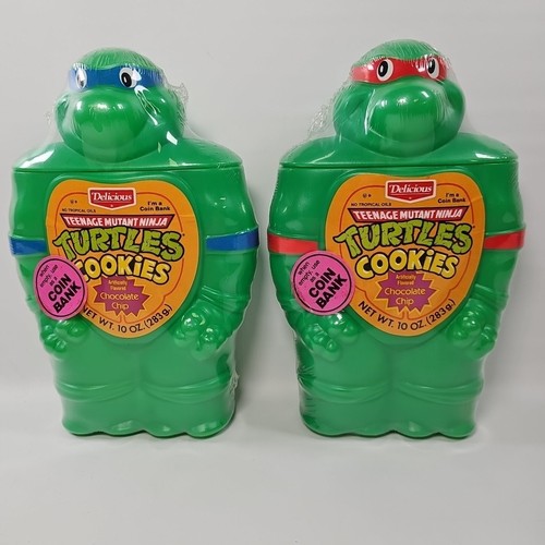 1990 TMNT Teenage Mutant Ninja Turtles Cookies Coin Bank Raphael + Leonardo NEW