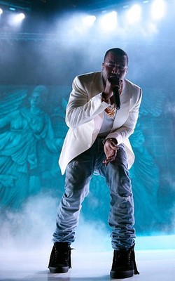 Kanye West performs at the 2011 Essence Music Festival at the Loui- Old Photo 2
